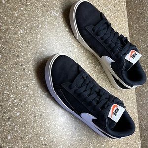 Ladies size 7 Nike black white white trim